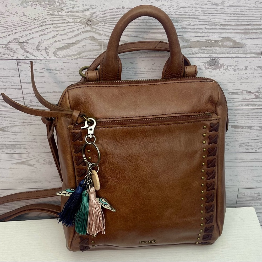 The Sak Tan Leather Backpack with Sea Turtle Tassel Charm